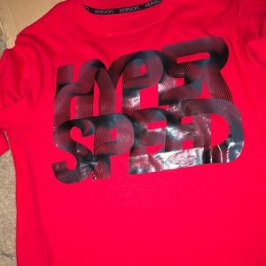 A large in men’s red XERSION shirt